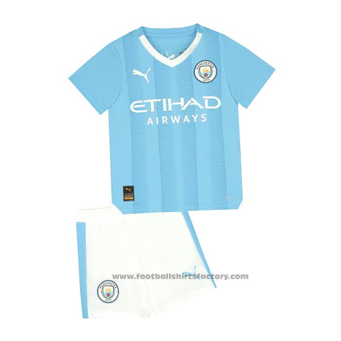 Buy Manchester City Home Shirt Kids 2023-2024 at Footballshirtsfactory